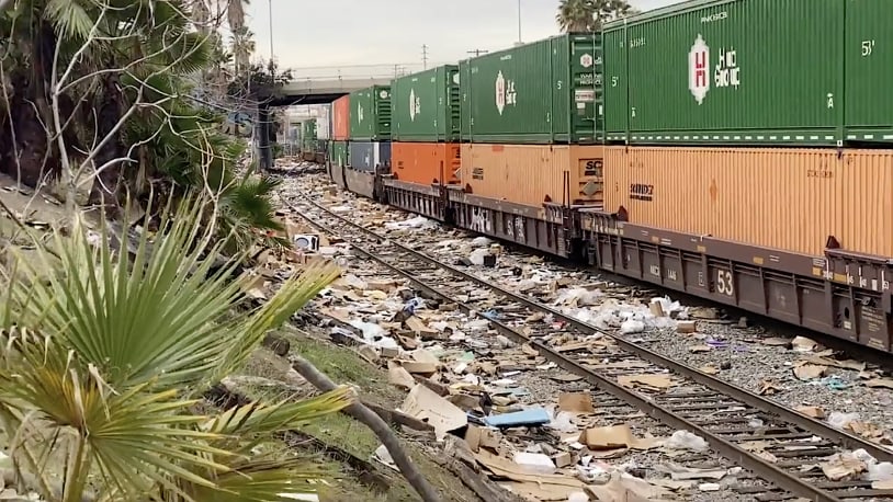 Thieves raid rail cars for shipped consumer packages, L.A. news crew reports from litter-strewn tracks