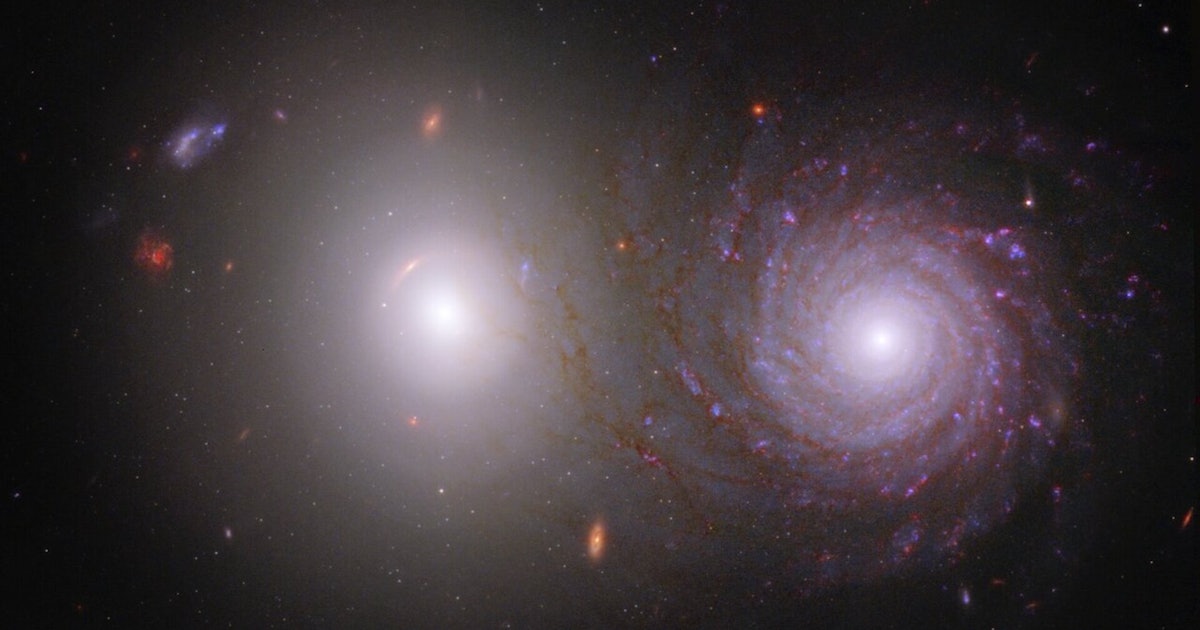 Webb and Hubble telescopes team up to image a dust-shrouded galaxy