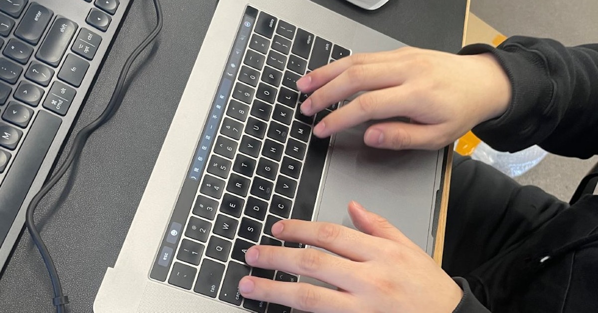 This Decapitated MacBook Keyboard is the Bizarre Upgrade Your Apple Vision Pro Needs