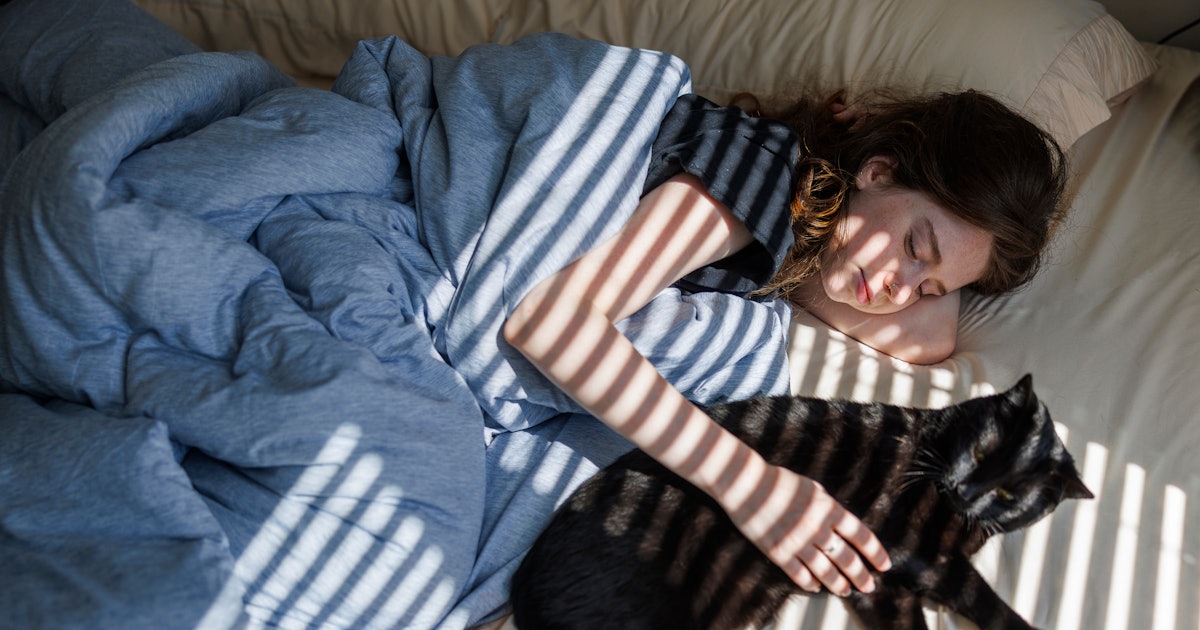 Sleeping With Your Pets Could Be Bad For This Unexpected Reason